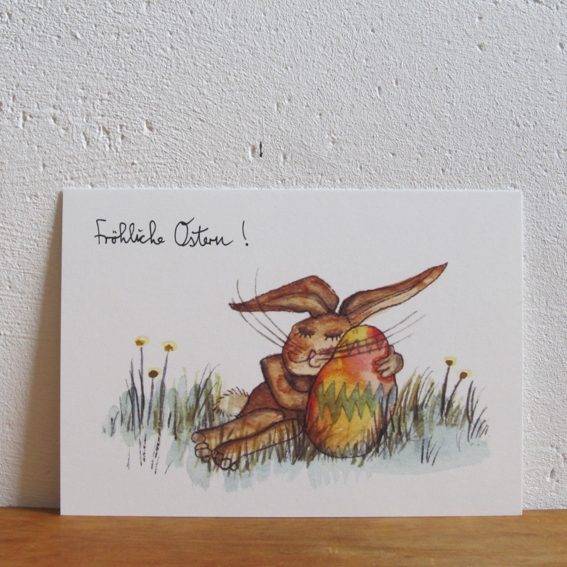 Osterhase mit buntem Ei