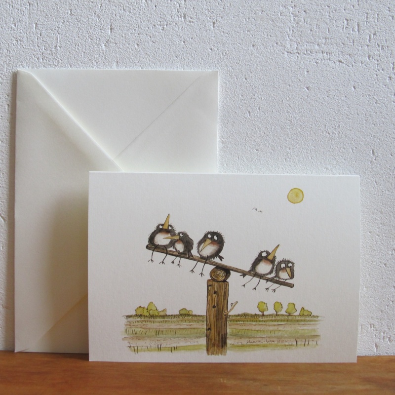 Wippe mit Schwalben in Landschaft